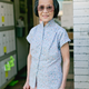 Joyce Wing, 89, with a home-sewn outfit.